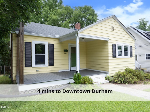 1410 Shawnee St, Durham, NC 27701 - bungalow-style home featuring a chimney and roof with shingles