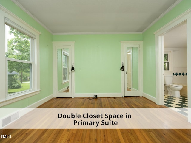 1410 Shawnee St, Durham, NC 27701 - empty room with crown molding and wood finished floors