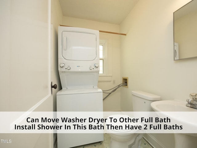 1410 Shawnee St, Durham, NC 27701 - washroom featuring estacked washer and dryer