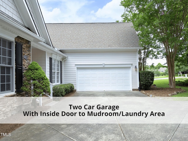 603 Red Cedar Cir, Durham, NC 27712 - view of side of home with driveway, roof with shingles, and a garage