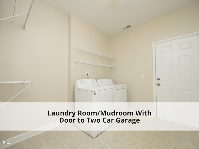 603 Red Cedar Cir, Durham, NC 27712 - laundry area featuring washer and dryer and baseboards