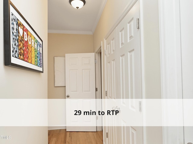 603 Red Cedar Cir, Durham, NC 27712 - hall featuring crown molding and wood finished floors