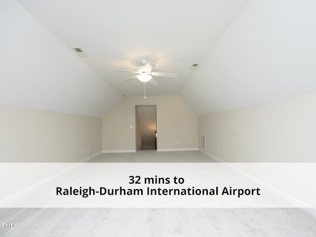 603 Red Cedar Cir, Durham, NC 27712 - additional living space featuring light carpet, vaulted ceiling, and a ceiling fan