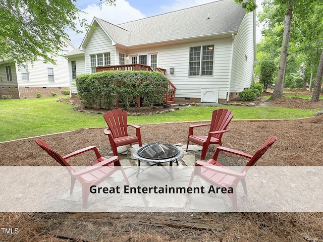 603 Red Cedar Cir, Durham, NC 27712 - rear view of property featuring a fire pit, crawl space, a yard, a deck, and roof with shingles