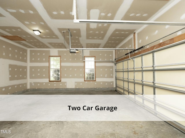 603 Red Cedar Cir, Durham, NC 27712 - garage featuring a garage door opener
