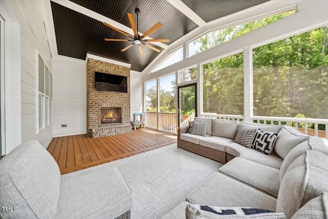 245 Tumbling River Dr, Wendell, NC 27591 - sunroom with an outdoor living space with a fireplace, ceiling fan, and lofted ceiling