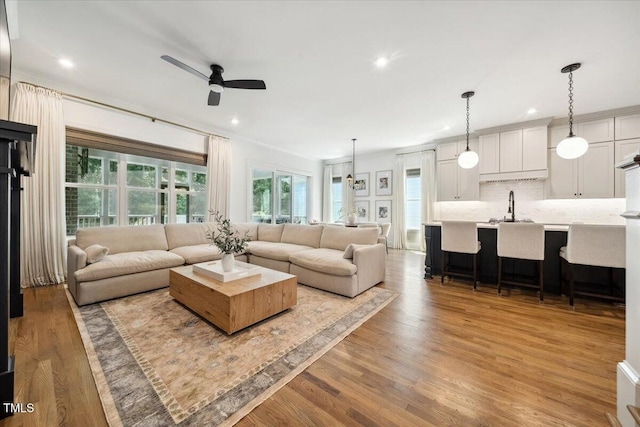 245 Tumbling River Dr, Wendell, NC 27591 - living room featuring ceiling fan, wood finished floors, and recessed lighting