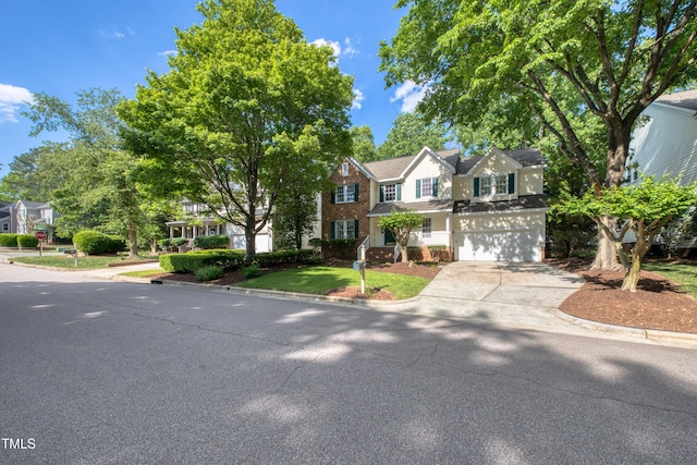 203 Halls Mill Dr, Cary, NC 27519 - view of front of home featuring concrete driveway and a garage