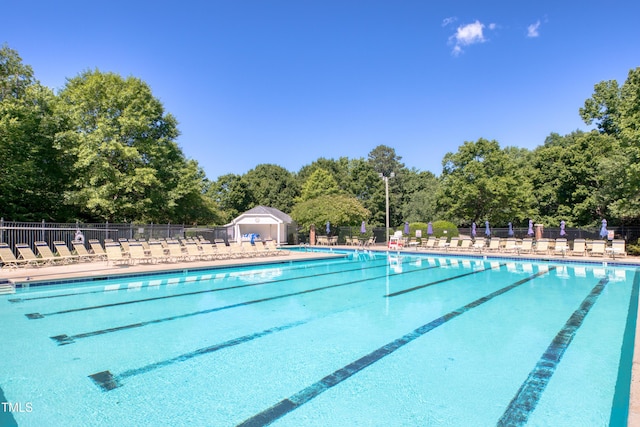 203 Halls Mill Dr, Cary, NC 27519 - community pool featuring view of wooded area