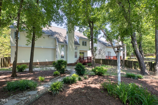 203 Halls Mill Dr, Cary, NC 27519 - back of house featuring a wooden deck and a shingled roof