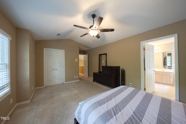 203 Halls Mill Dr, Cary, NC 27519 - bedroom with light carpet, lofted ceiling, baseboards, a ceiling fan, and a closet
