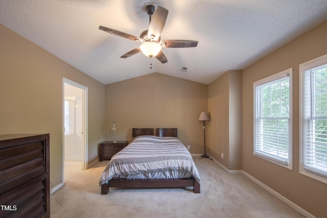 203 Halls Mill Dr, Cary, NC 27519 - bedroom with light colored carpet, baseboards, a textured ceiling, ceiling fan, and lofted ceiling