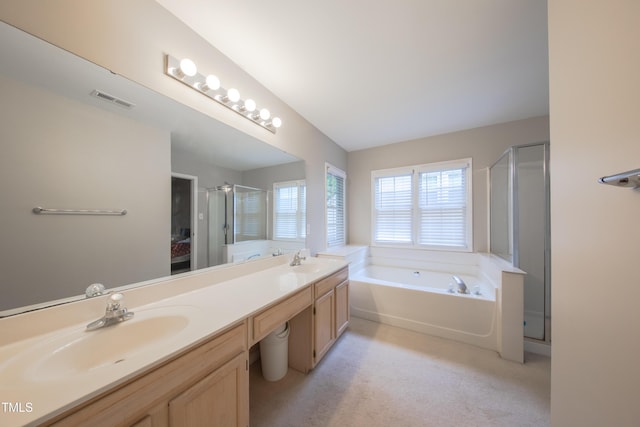 203 Halls Mill Dr, Cary, NC 27519 - bathroom featuring a bath, double vanity, a stall shower, and connected bathroom