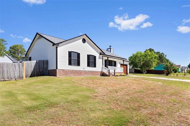 6466 Applewhite Rd, Fayetteville, NC 28304 - ranch-style home featuring a garage, concrete driveway, brick siding, and a chimney