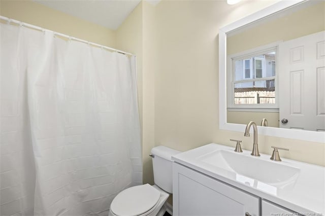6466 Applewhite Rd, Fayetteville, NC 28304 - full bath with toilet, vanity, and a shower with curtain