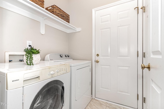 8512 Erinsbrook Dr, Raleigh, NC 27617 - laundry area featuring independent washer and dryer and light marble finish flooring