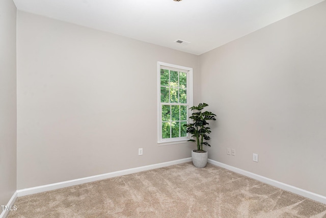 8512 Erinsbrook Dr, Raleigh, NC 27617 - carpeted spare room featuring baseboards