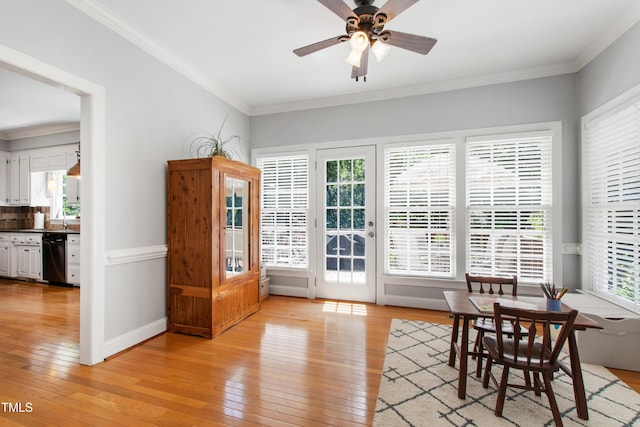 3304 Buck Run Trl, Wake Forest, NC 27587 - dining room with light wood-style flooring, ceiling fan, and crown molding