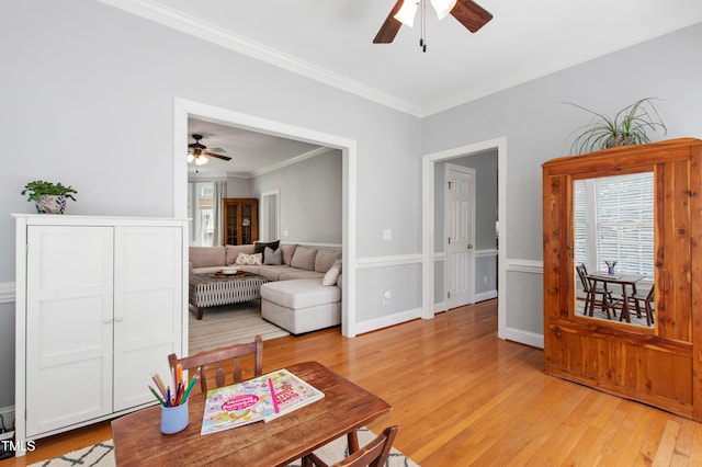3304 Buck Run Trl, Wake Forest, NC 27587 - living area featuring a ceiling fan, healthy amount of natural light, ornamental molding, and light wood-type flooring