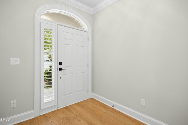 95113 Vance Knls, Chapel Hill, NC 27517 - entryway with ornamental molding, baseboards, and light wood-style flooring