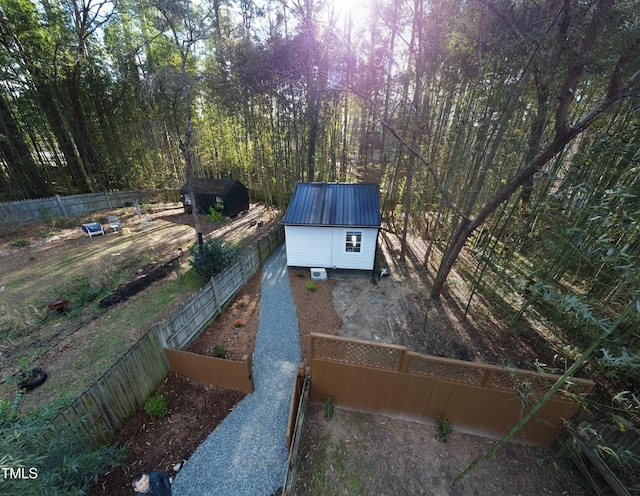 2907 University Dr, Durham, NC 27707 - fenced backyard with a storage unit