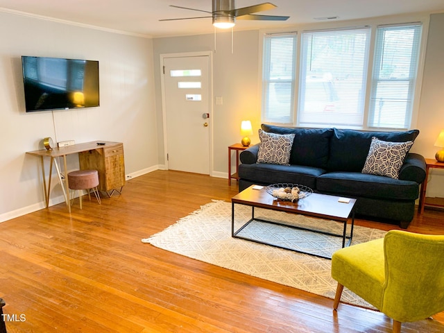 2907 University Dr, Durham, NC 27707 - living room featuring wood finished floors, a ceiling fan, and ornamental molding