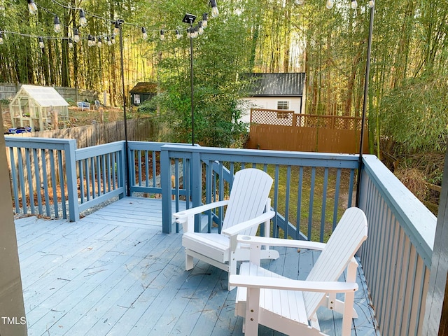 2907 University Dr, Durham, NC 27707 - wooden deck featuring an exterior structure and an outbuilding