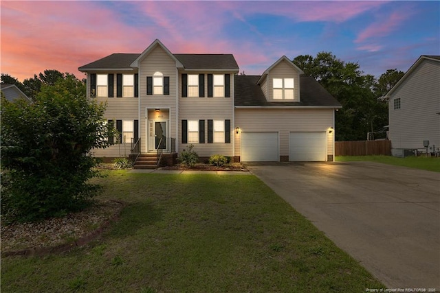 4055 Beaubien Dr, Fayetteville, NC 28306 - colonial house featuring driveway and an attached garage
