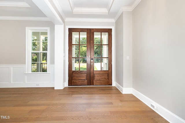 59 Cardinal Dr, Whispering Pines, NC 28327 - entryway with french doors, light wood-style flooring, wainscoting, and crown molding