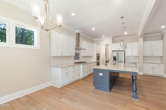 59 Cardinal Dr, Whispering Pines, NC 28327 - kitchen with appliances with stainless steel finishes, wall chimney range hood, white cabinets, decorative backsplash, and recessed lighting