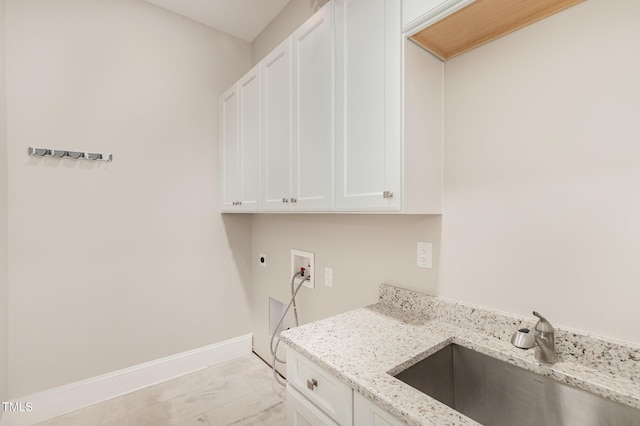 59 Cardinal Dr, Whispering Pines, NC 28327 - washroom with hookup for an electric dryer, cabinet space, light marble finish floors, hookup for a washing machine, and baseboards