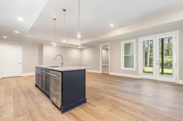 59 Cardinal Dr, Whispering Pines, NC 28327 - kitchen featuring a sink, baseboards, light wood-style floors, an island with sink, and recessed lighting