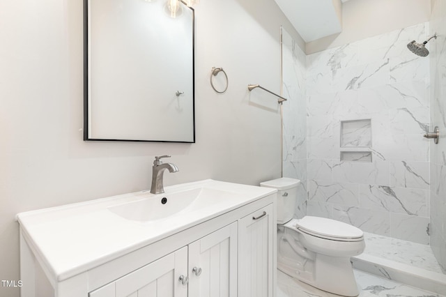 59 Cardinal Dr, Whispering Pines, NC 28327 - full bathroom with vanity, toilet, marble look tile flooring, and tiled shower