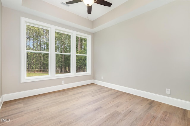 59 Cardinal Dr, Whispering Pines, NC 28327 - spare room with light wood finished floors, baseboards, and ceiling fan