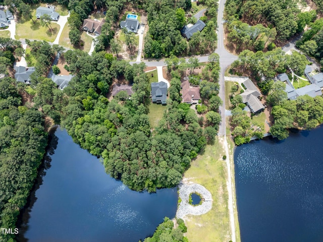 59 Cardinal Dr, Whispering Pines, NC 28327 - aerial overview of property's location featuring a nearby body of water and nearby suburban area