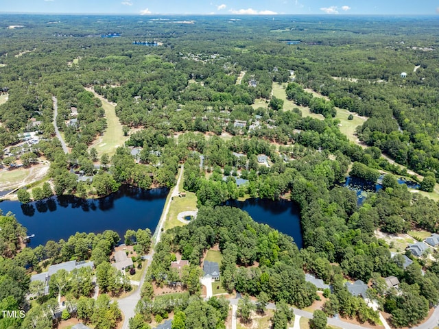 59 Cardinal Dr, Whispering Pines, NC 28327 - drone / aerial view of a large body of water and a forest