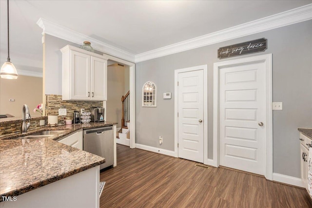 110 Lexington Ave, Zebulon, NC 27597 - kitchen featuring stainless steel dishwasher, a sink, crown molding, white cabinetry, and backsplash