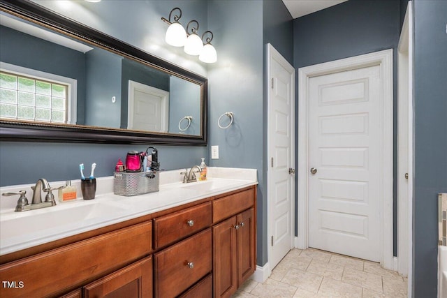 110 Lexington Ave, Zebulon, NC 27597 - full bathroom with double vanity and baseboards