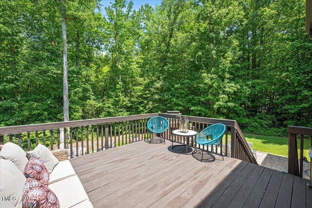 110 Lexington Ave, Zebulon, NC 27597 - wooden terrace with an outdoor hangout area