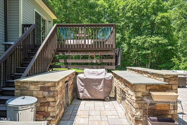 110 Lexington Ave, Zebulon, NC 27597 - view of patio featuring stairs and a deck