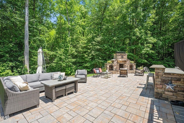 110 Lexington Ave, Zebulon, NC 27597 - view of patio / terrace featuring an outdoor living space with a fireplace