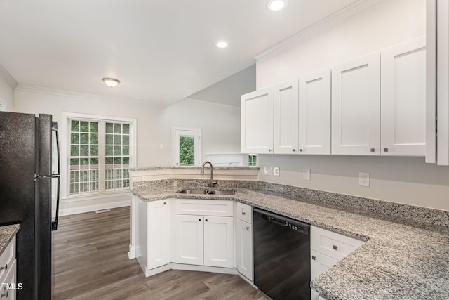 7936 Milltrace, Raleigh, NC 27615 - kitchen with a sink, black appliances, crown molding, a peninsula, and white cabinets