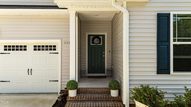 159 Clear Water Rd, Louisburg, NC 27549 - doorway to property with a garage