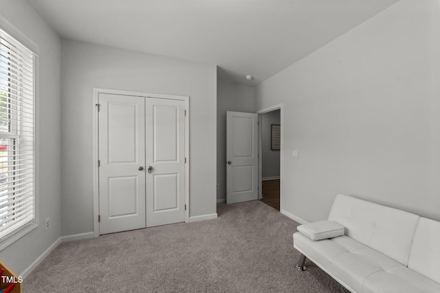 159 Clear Water Rd, Louisburg, NC 27549 - living area with carpet floors and baseboards