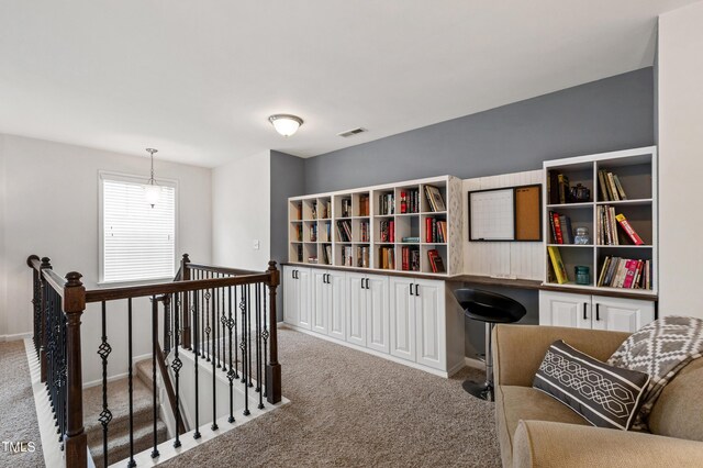 1577 Tice Hurst Ln, Apex, NC 27502 - sitting room with an upstairs landing, carpet, and baseboards
