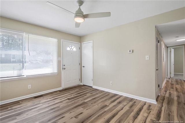 1486 Thelbert Dr, Fayetteville, NC 28301 - entryway featuring wood finished floors, baseboards, and a ceiling fan