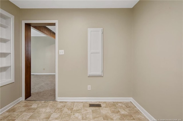 1486 Thelbert Dr, Fayetteville, NC 28301 - empty room with baseboards and built in features