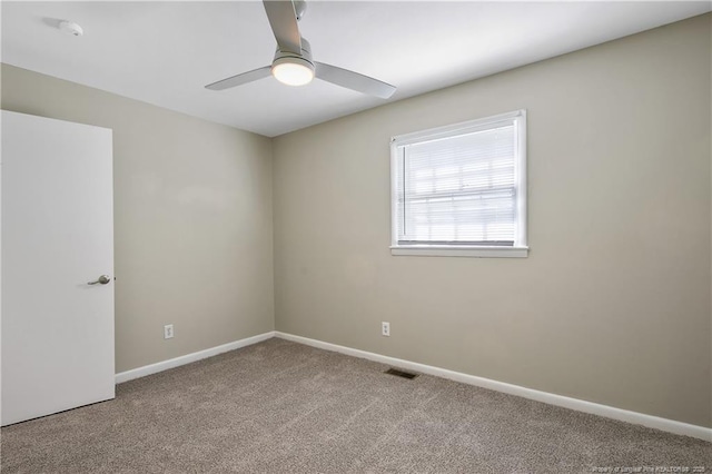 1486 Thelbert Dr, Fayetteville, NC 28301 - carpeted empty room featuring a ceiling fan, baseboards, and a smoke detector