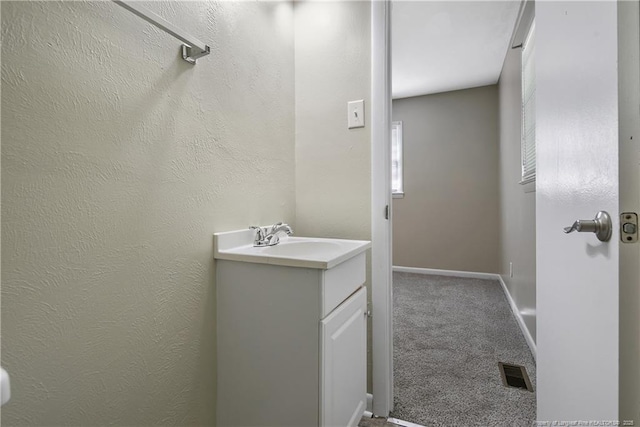 1486 Thelbert Dr, Fayetteville, NC 28301 - bathroom with vanity and baseboards