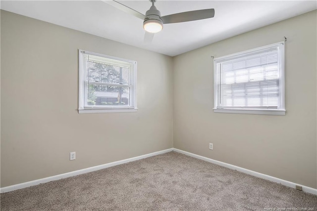 1486 Thelbert Dr, Fayetteville, NC 28301 - empty room featuring carpet flooring, ceiling fan, and baseboards